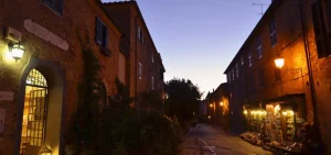 An evening walk in the narrow streets of a medieval village in tuscany