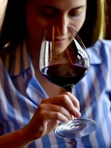Guest tasting Sassicaia red wine