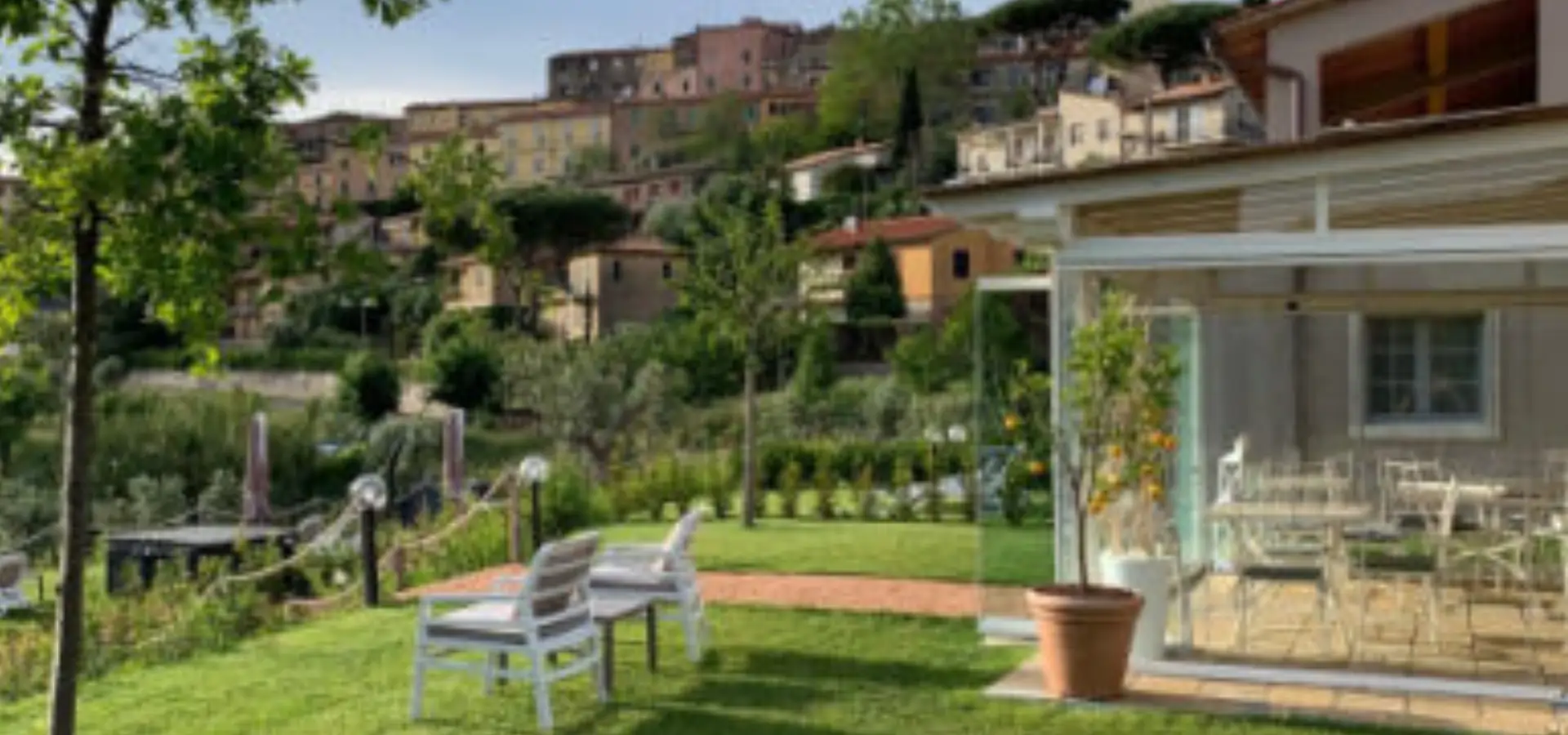 Lounge chairs at boutique accommodations in Castagneto Carducci