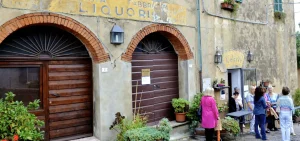 Visiting a local spirit maker in a small village in Bolgheri Tuscany